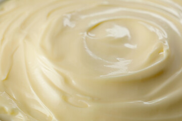 Fresh mayonnaise sauce as background, closeup view