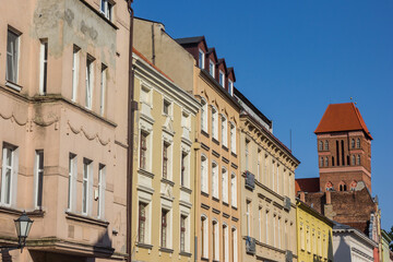 Fototapeta na wymiar Colorful facades and tower of the St. James church in Torun, Poland