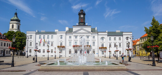 Panorama of the fountain in front of the town hall in Plock, Poland