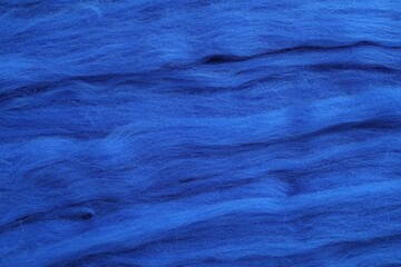 Blue felting wool as background, closeup view - obrazy, fototapety, plakaty