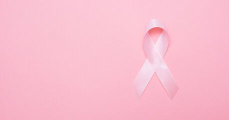 Pink breast cancer awareness ribbon, copy space