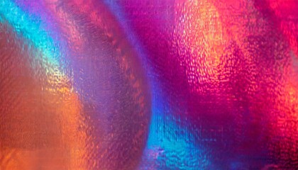 close up of ethereal bright neon pink magenta orange blue purple holographic metallic foil...