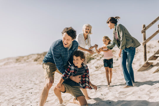 Multi-generational family enjoying a fun day at the beach