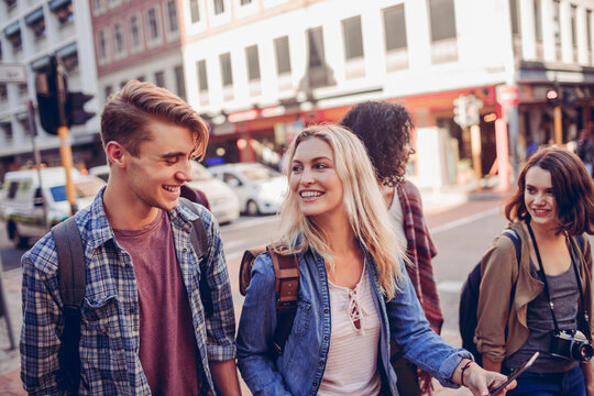 Diverse group of young friends exploring the city