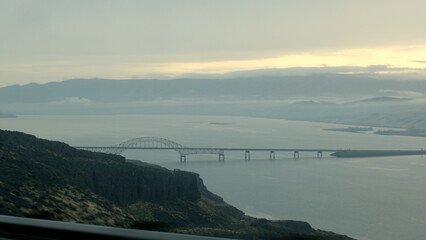 Moody landscape view of Vantage Bridge and Columbia River on a misty and foggy wintery fall season...