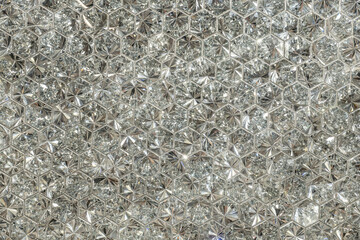 Brilliant diamond shape background.
Multifaceted wallpaper with sparkling lights.
