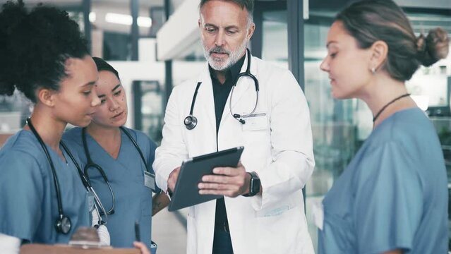 Man, Doctor And Tablet In Meeting With Nurses, Interns Or Medical Team For Research Or Results At Hospital. Surgeon Or Healthcare Professional Thinking With Practitioners On Technology At Clinic