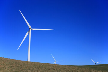 wind turbines in a landscape.