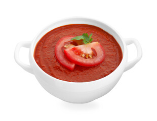 Delicious tomato cream soup in bowl isolated on white
