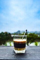 Vietnamese Style Drip Coffee with Condense Milk, close-up in Vietnam