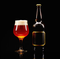 Beer in glass and beer bottle on a dark black background. Mugs with drink like Ipa, Pale Ale, Pilsner, Porter or Stout