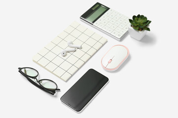 Composition with phone, eyeglasses, calculator and plant on light background