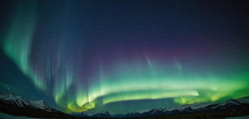  a bright green and purple aurora bore in the sky above a snow covered mountain range with snow - capped mountains in the foreground.