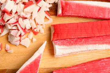 Tasty crab sticks on table, closeup © Pixel-Shot