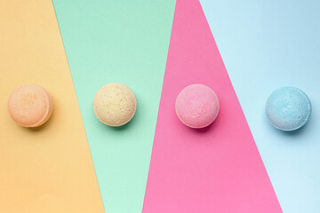 Bath bombs on color background