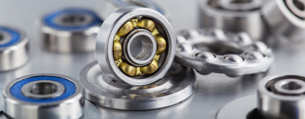 different bearings on a metal background. Part of mechanism.