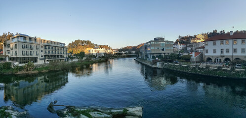 Panoramic view of the thermal area of S. Pedro do Sul, Vouga River and buildings on the banks of the river supporting thermal spas, hotels and others, Viseu, Portugal - obrazy, fototapety, plakaty