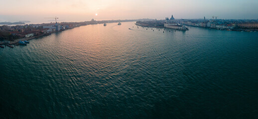 Top aerial panoramic view across Venice before sunset phase