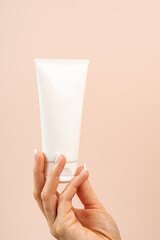 Cream mockup closeup product presentation, holding hand, beauty product