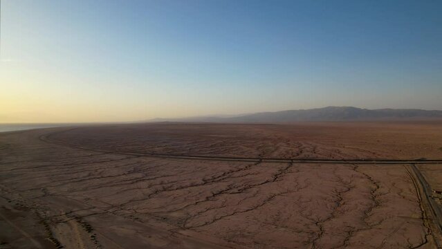 Panoramic aerial view to the Southern California Salton Sea landscape at the sunset. Bombay Beach. Traveling around USA. Drone 4K footage. Landmarks of US. 