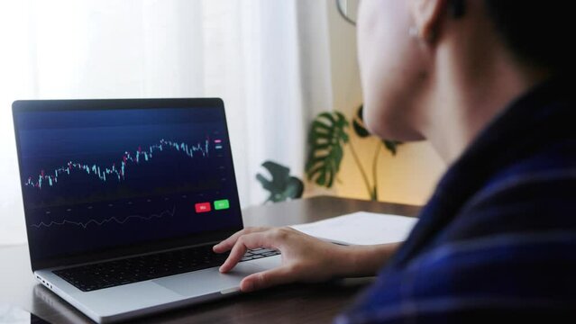 Trader woman analyzing strategy for stock market investment at home office. Crypto portfolio and digital money concept