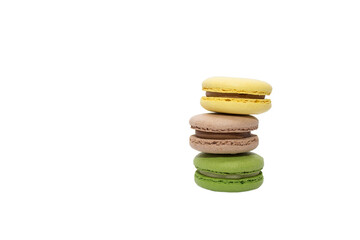 Different types of macaroons in motion falling on a white background, macaron
