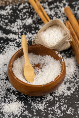 dried coconut shavings on a slate board