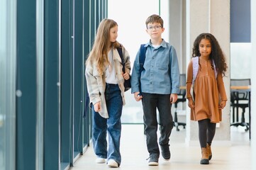 Group of elementary school kids in a school corridor