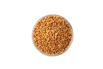 Raw buckwheat in a bowl isolated on a white background. Wheat grains, porridge, cereals, raw buckwheat in a plate. Healthy food. Porridge. Diet. Organic cerea