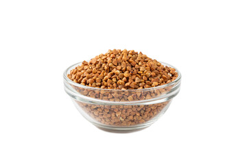 Raw buckwheat in a bowl isolated on a white background. Wheat grains, porridge, cereals, raw buckwheat in a plate. Healthy food. Porridge. Diet. Organic cerea