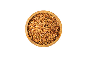 Raw buckwheat in a bowl isolated on a white background. Wheat grains, porridge, cereals, raw buckwheat in a plate. Healthy food. Porridge. Diet. Organic cerea