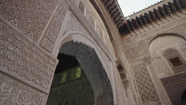 Al Attarine Madrasa Fes Fez, Morocco - 14th-century school for Islamic studies featuring ornate tile work and dramatic architecture
