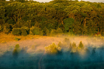 Lake in the morning . Fog on the lake at morning . Sunrise over the forest with fog . Summer vibes...