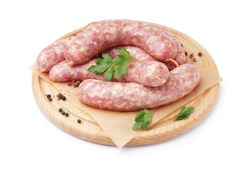 Board with raw fresh sausages and spices on white background