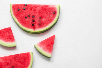 Pieces of fresh watermelon on white background