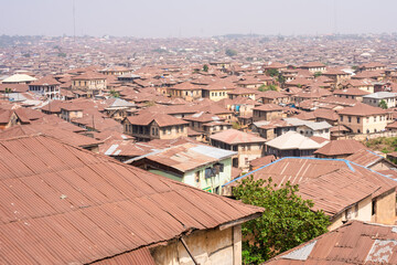 Buidlings with rustic roofing sheets in Ibadan - Oyo, Nigeria on Decmber 26, 2023. - obrazy, fototapety, plakaty