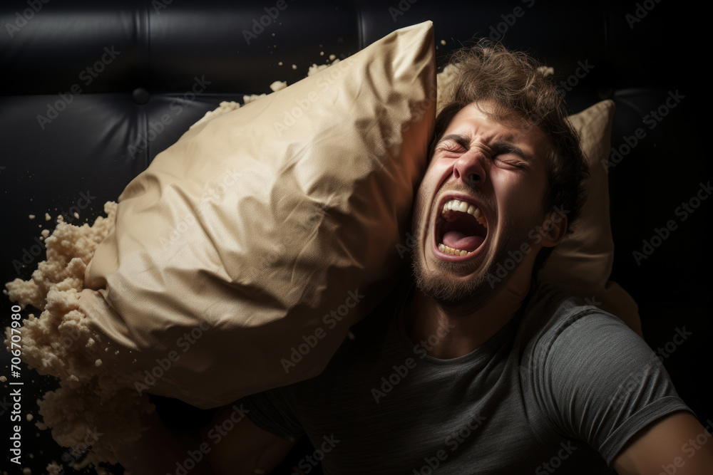 Wall mural a person venting frustration by yelling into a pillow, symbolizing the need for healthy ways to cope