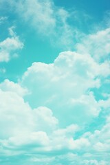 Naklejka na ściany i meble Turquoise sky with white cloud background
