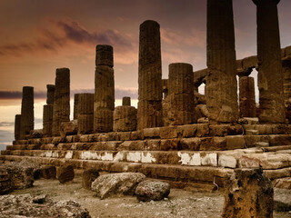 Agrigento (Italy, Sicily) the Valley of the Temples, a suggestive dawn illuminates the ruins of the...