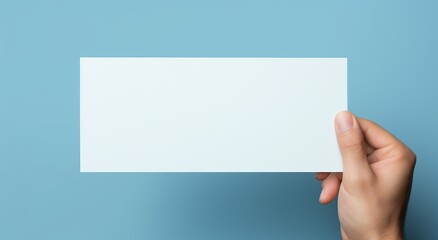 Fototapeta premium hand holding blank paper
