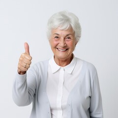 senior person showing thumbs up