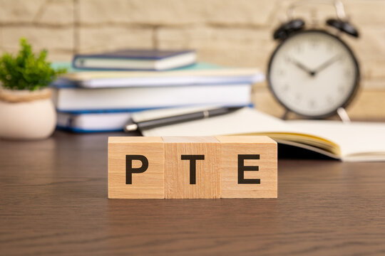 PTE - word concept from wooden blocks. wooden cubes with letters