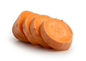 Set of fresh whole and sliced sweet potatoes