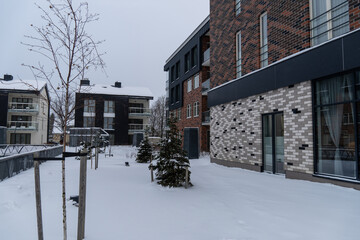 New modern buildings during winter time with a lot of snow. Uus-Veerenni district. Tallinn,...