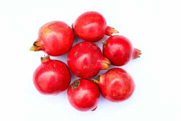Pomegranate fruits on white background top view 