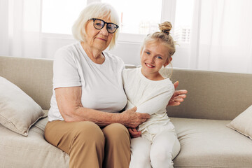 Granddaughter girl child couch grandmother