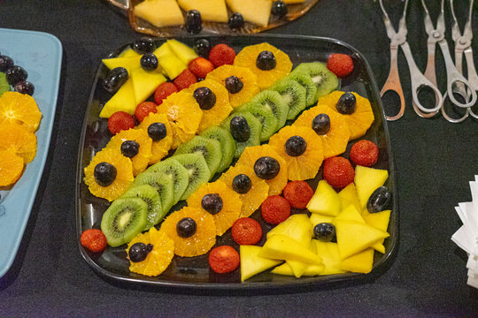 shale stone board with various fruits for a feast