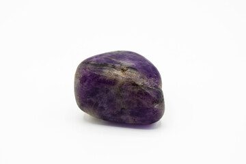 Fototapeta premium Purple amethyst stone on white background