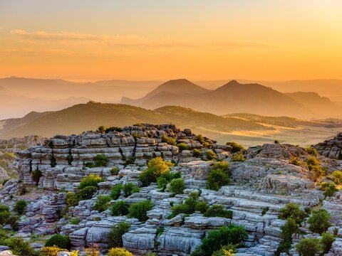Limestone rock formations at sunset, El Torcal nature reserve, Torcal de Antequera, Malaga province, Andalusia, Spain, Europe