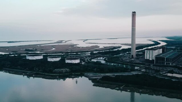 Aerial panoramic shot of the decommissioned coal-fired power plant on the Po delta.